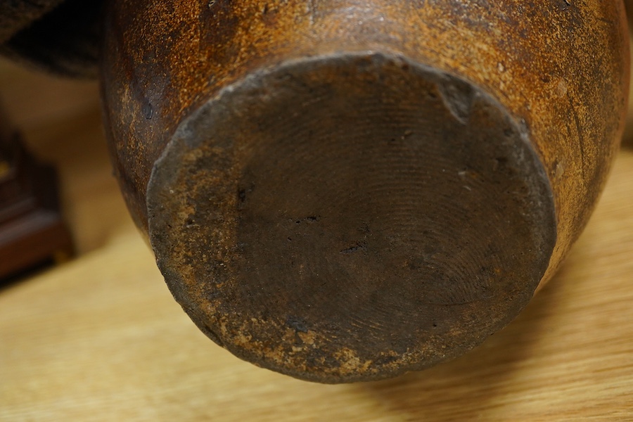 A Bellarmine stoneware jug, 17th century, 36cm high